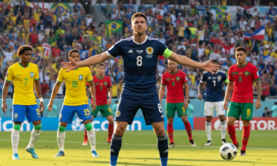 plongez dans l'ambiance électrique de la coupe du monde avec clarke prêt à affronter le brésil, le maroc et haïti, dans un affrontement où l'écosse vise la victoire.